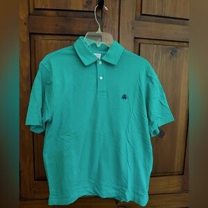 Brooks Brothers men’s size small cotton teal color polo shirt. Good condition.